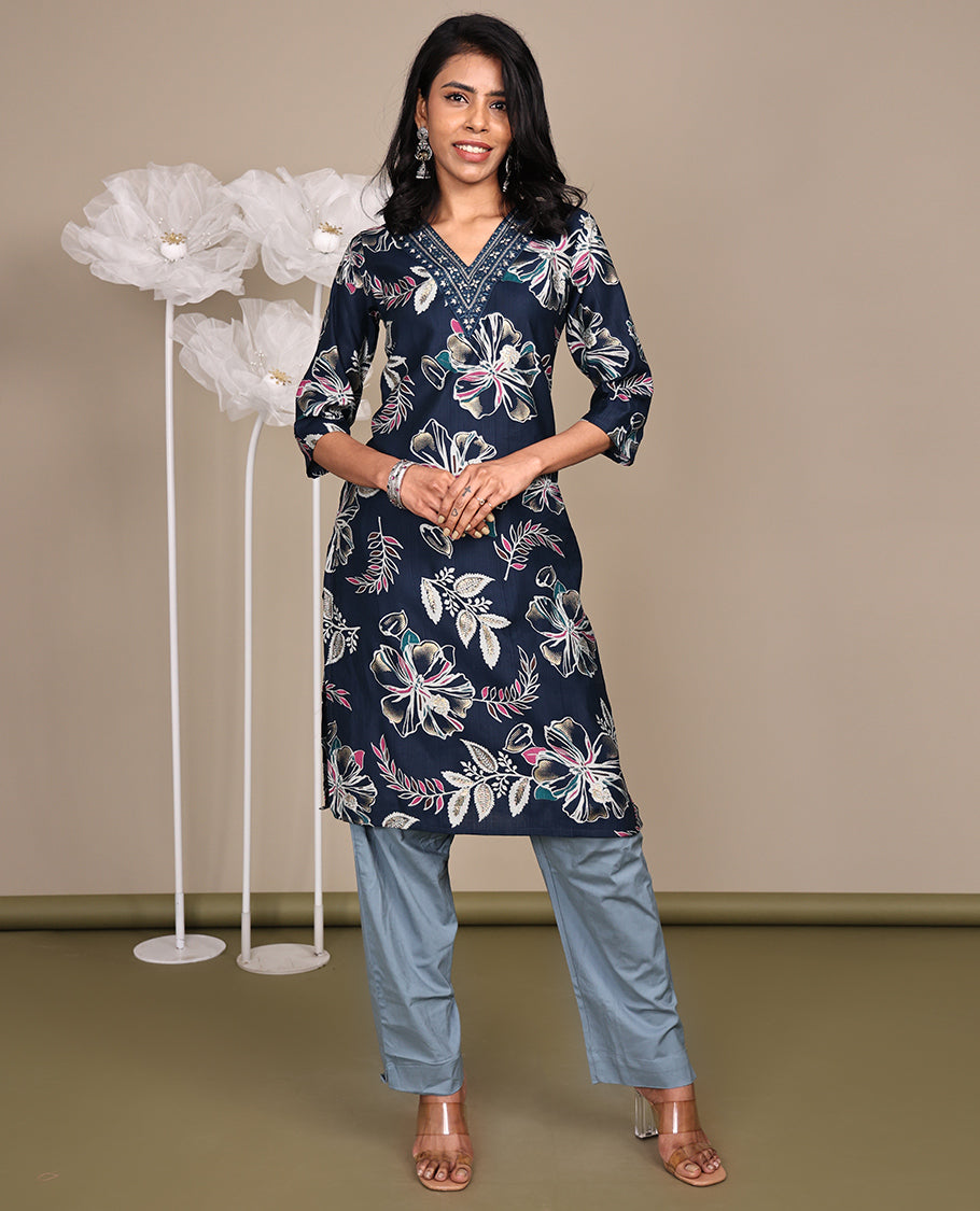 Blue Floral Printed Knee-Length Cotton Kurti, Prettified with a V-Neckline, 3/4 Sleeves, and a Straight-Cut Length