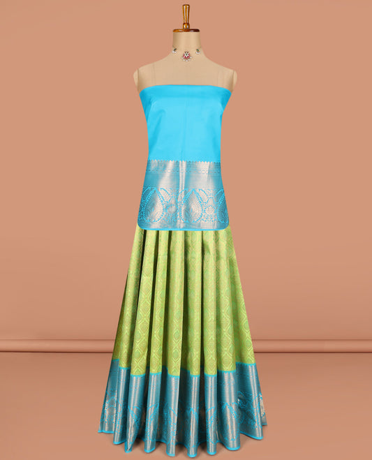 Green pure-silk half saree, jacquard with contrast traditional zari bordered skirt, blouse of thilakam mokku,poun, vanki, and thilakam designs , and zari design dhavani