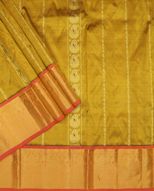 Green puresilk halfsaree, zari design skirt, contrast blouse, and border features rekku, diamond, arumbu manga, jaal design, and floral design dhavani