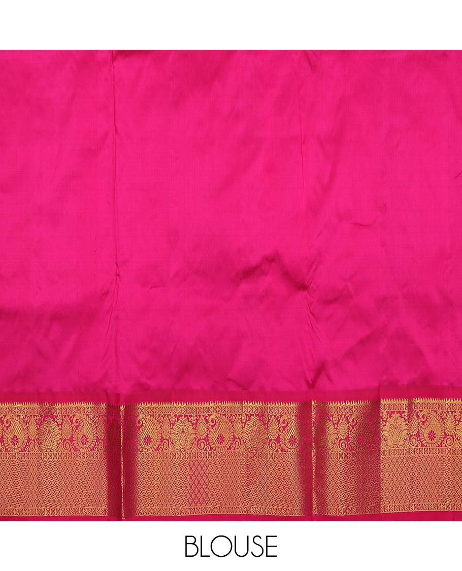 Green puresilk halfsaree, zari design skirt, contrast blouse, and border features rekku, diamond, arumbu manga, jaal design, and floral design dhavani