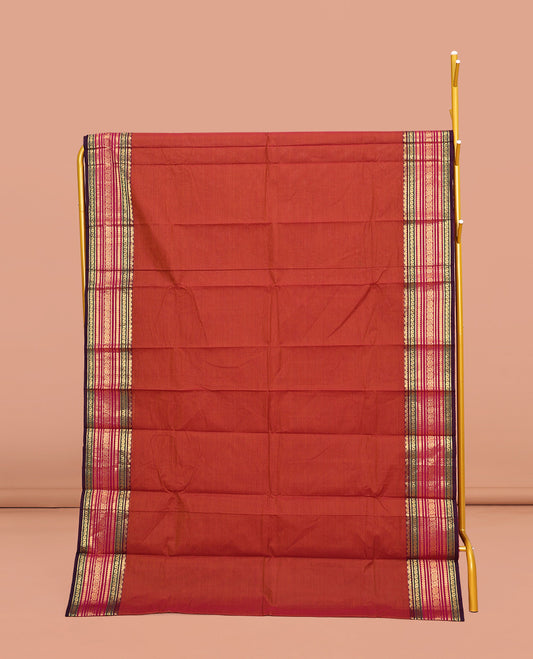 Orange Plain Chettinad Cotton Saree, Complemented by a Contrast Traditional Zari Design Border, Pallu of Stripes, and Paired with a Matching Blouse