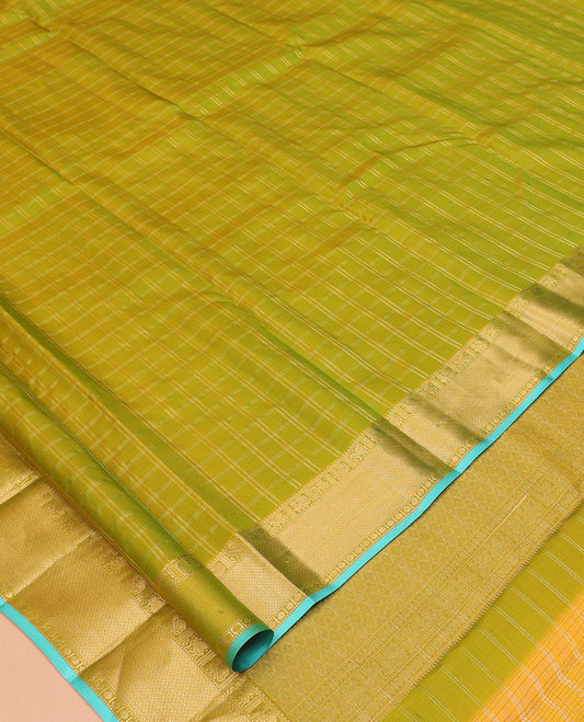 Green Vasundhara Silk Saree, Woven with Zari Checks, a Zari Border of Mayil, Kuthirai, Muthu, Mayil Kann and Rudraksham Designs, Grand Pallu, and a Contrast Blouse