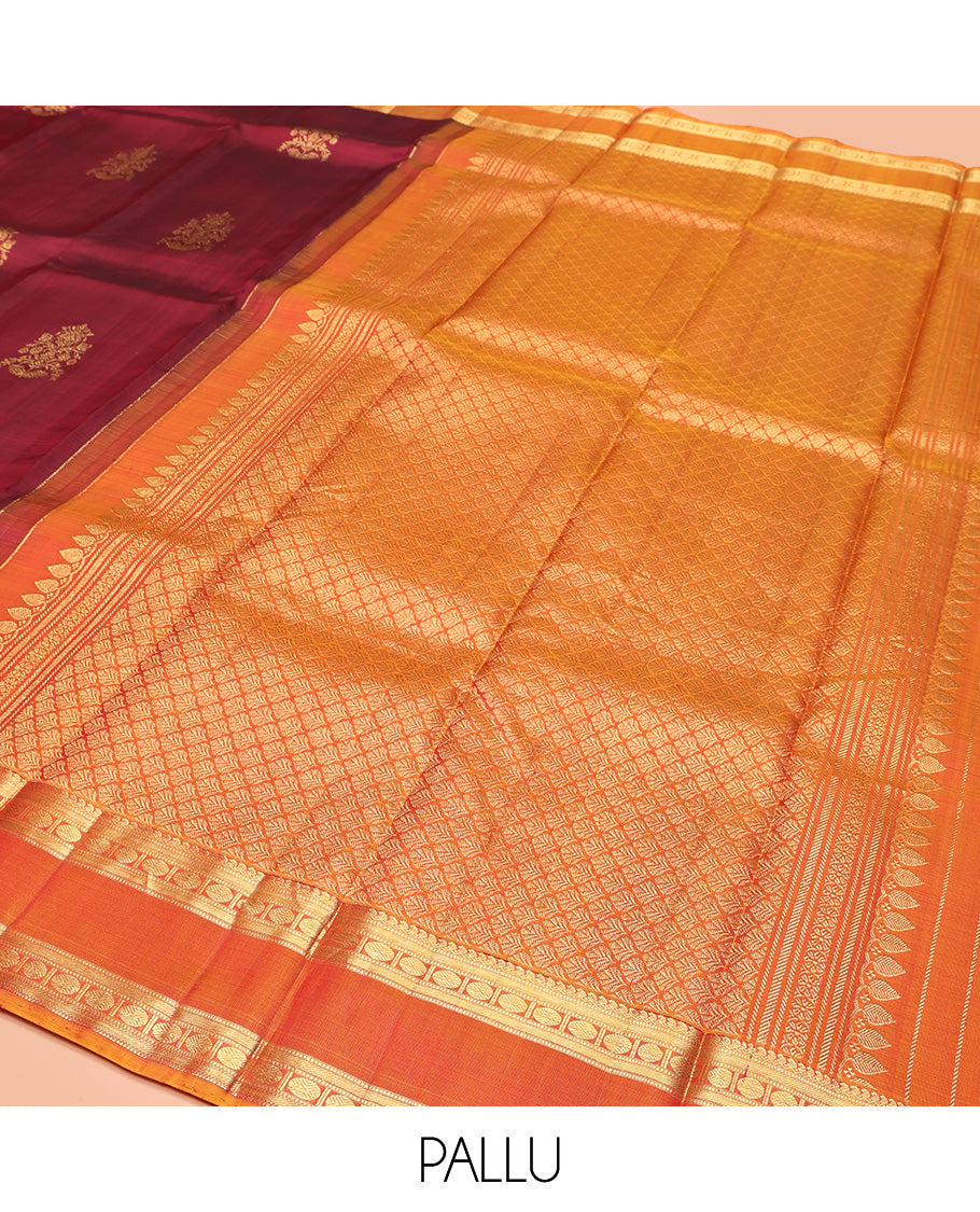 Red Kanchipuram Silk Saree, Enriched with Zari Buttas All Over Its Body, Complemented by Contrast Rettai Pettu Border of Manga Mokku, Muthu, Banaras, and Poun Designs, Grand Pallu, and Paired with a Contrast Blouse