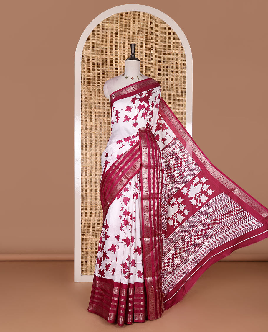 Wine leaf motifs printed dola silk saree, contrast traditional zari border of Rudraksham and peacock motifs, geometric printed pallu and contrast printed blouse