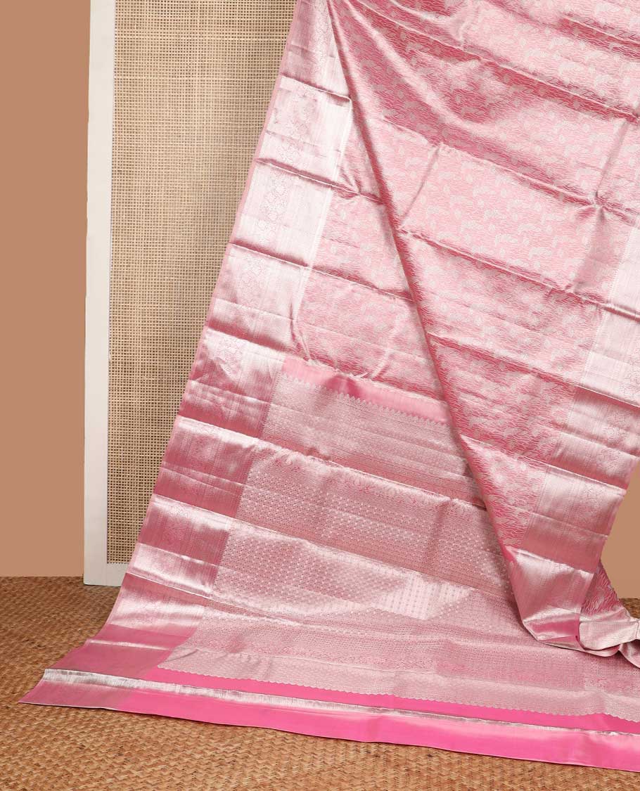Light pink design kancheepuram tissue silk saree with self border of intricate zari design & geometric design pallu