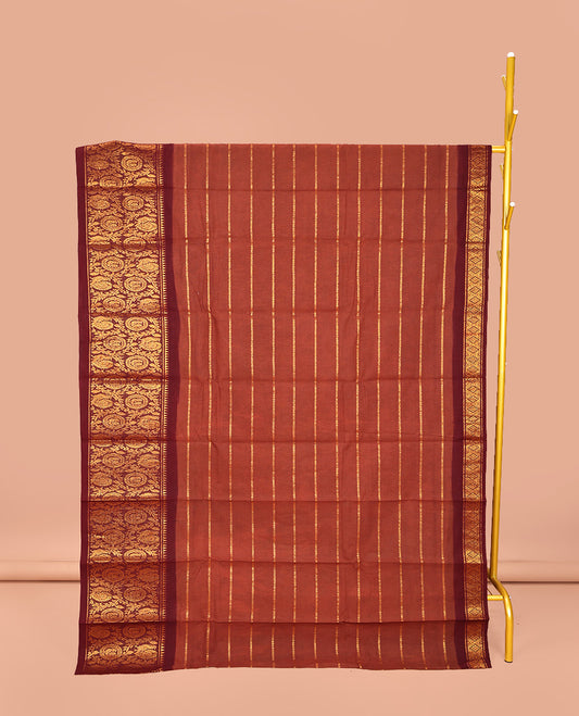 Rust Sungudi Cotton Saree, Embellished with Stripes on Its Body, Complemented by a Contrast Border of Round Peacock and Floral Vine Designs, Zari Striped Pallu, and Has No Blouse