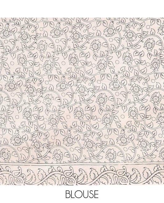 Orange floral machine-printed kalamkari cotton saree, contrast chevron & floral border & paisley & diamond pallu