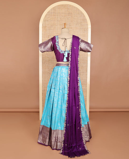 Baby blue floral art silk half saree with contrast zari design border, embroidered blouse & floral embroidery dhavani
