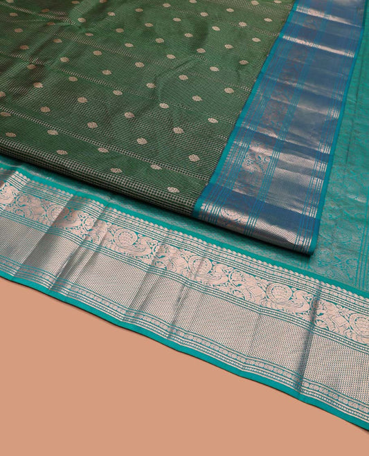 Green Vasundhara Silk Saree, Steeped in Richness of Zari Buttas and Checked Design on Its Body, Complemented by a Contrast Border of Manga, Floral, Mayil, Yaanai, and Ara Maadam Designs, Opulently Embellished Jaal Pallu, and Paired with a Contrast Blouse