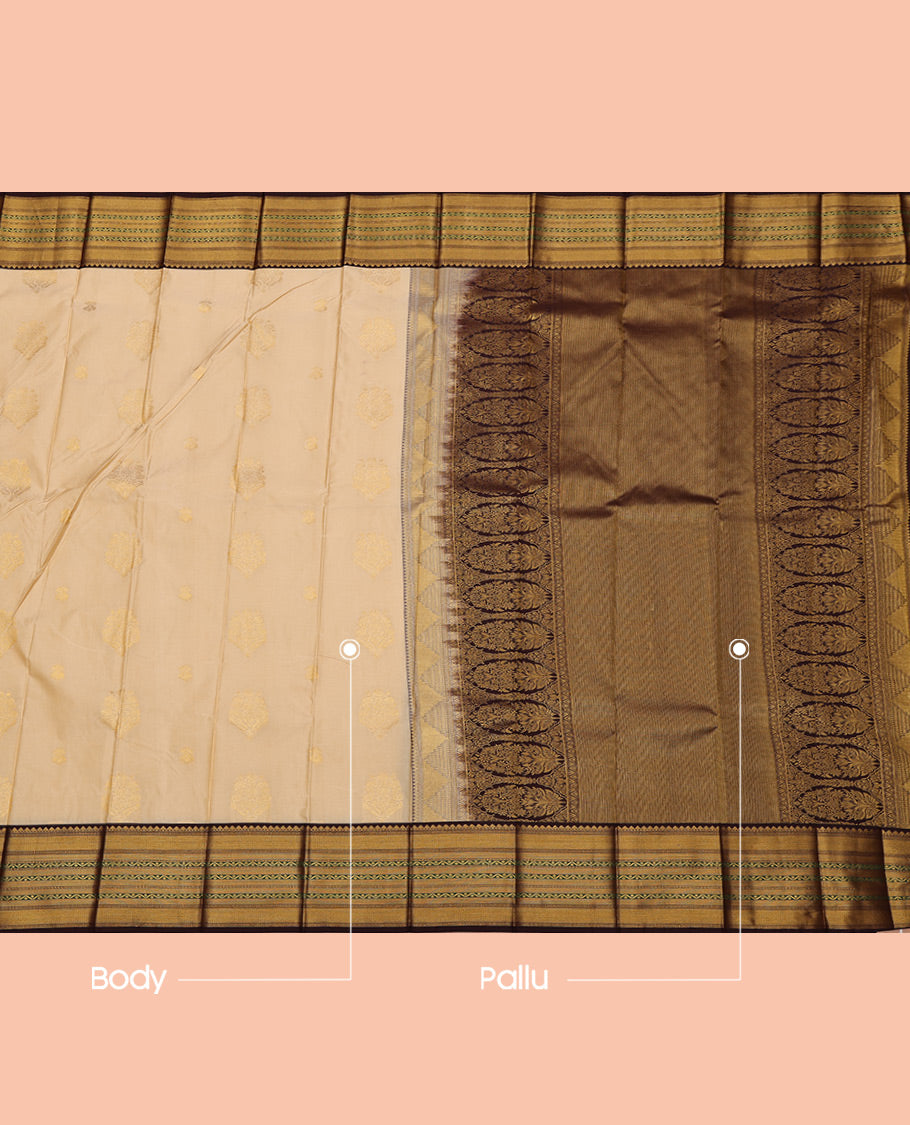 Cream Budget Silk Saree, Embellished with Zari Buttas All Over Its Body, Complemented by a Contrast Traditional Zari Design Border, Grand Pallu, and Paired with a Contrast Blouse