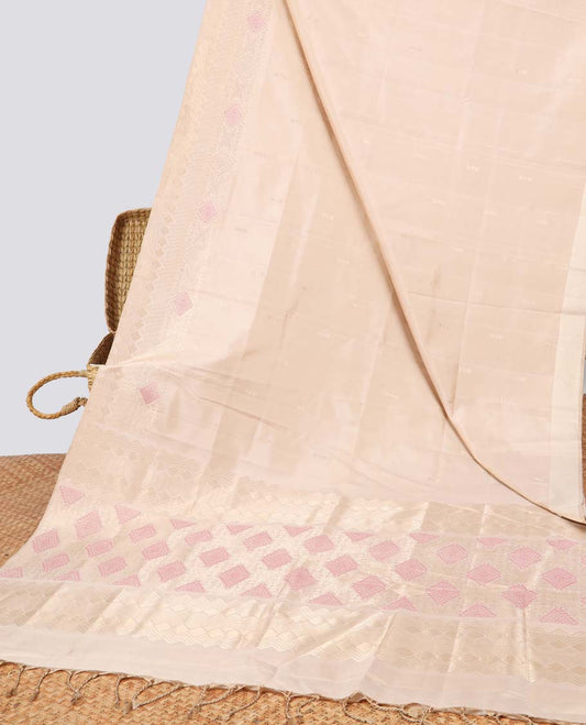 Cream small buttas soft silk saree with self zari design border & pallu of argyle pattern