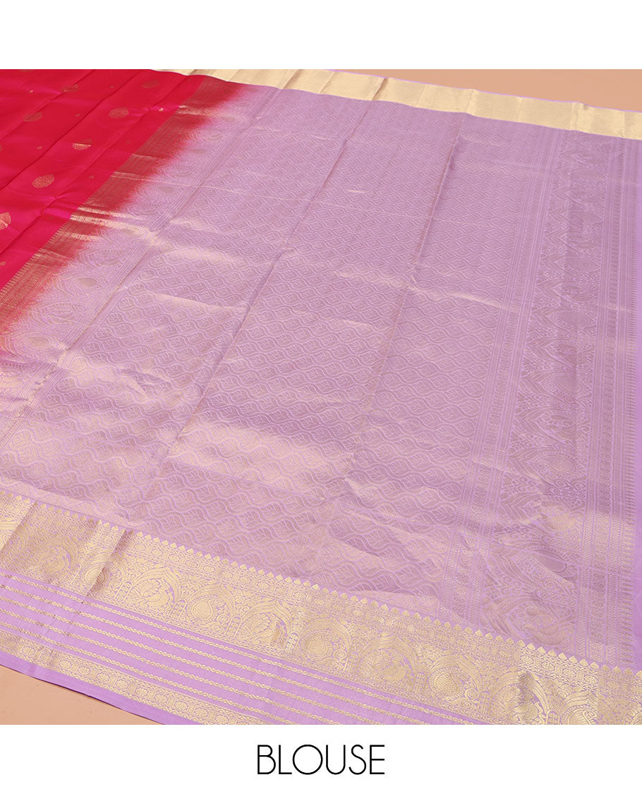 Pink Vasundhara Lite Silk Mix Saree, Adorned with Zari Buttas on Its Body, Complemented by a Contrast Border of Yaanai, Thilakam Mokku, Neli, Mayil, Arumbu Manga, and Kamalam Designs, Grand Ogee-Patterned Pallu, and Paired with a Contrast Blouse