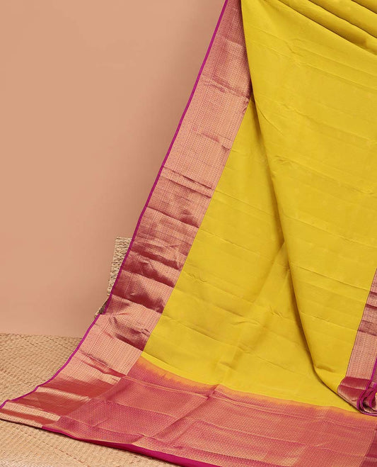 Yellow vasundhara elite silk saree with contrast intricate zari design border & zari jaal design pallu