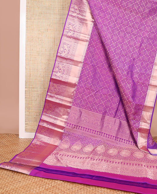 Purple jacquard kancheepuram silk saree with self border of intricate zari design & floral design pallu