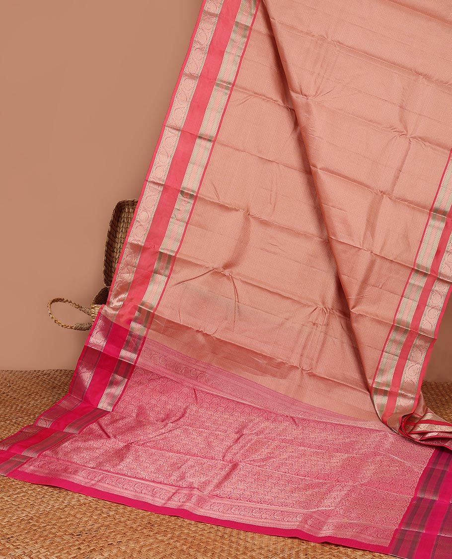 Pink checked silk saree with contrast border of thilakam mokku, banaras, kuyil kann, poo chakram design & jaal design pallu