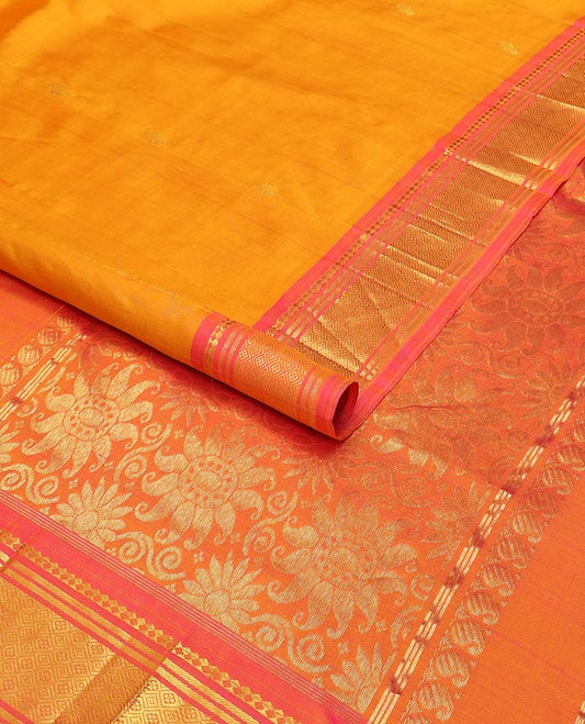 Orange buttas kancheepuram silk saree with contrast intricate zari design border & floral zari design pallu