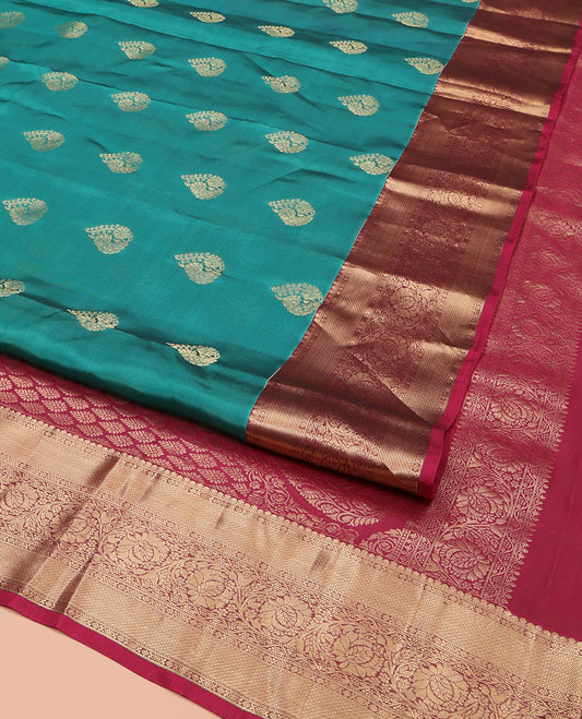 Teal Vasundhara Lite Silk Mix Saree, Elegantly Highlighted with Zari Buttas, Complemented by a Contrast Border of Kodi Visiry Designs, Opulently Embellished Pallu, and Paired with a Contrast Blouse