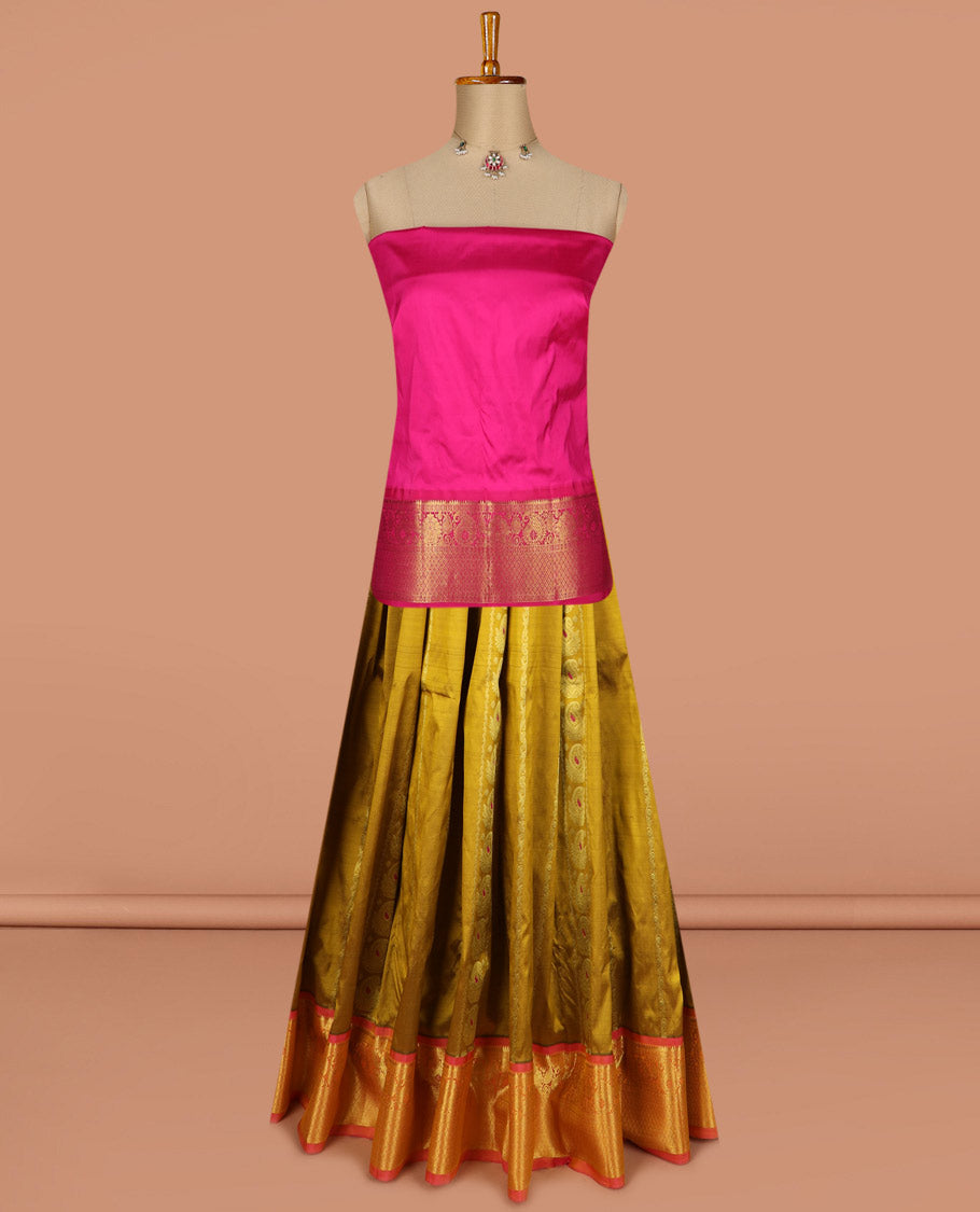 Green puresilk halfsaree, zari design skirt, contrast blouse, and border features rekku, diamond, arumbu manga, jaal design, and floral design dhavani