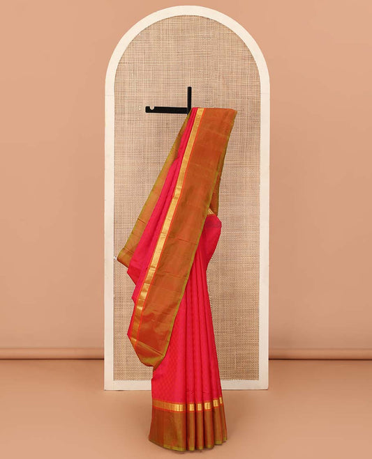 Red paiyadi kattam Kanchipuram silk saree, contrast border of rekku, and vanki designs, and sparsely checked pallu