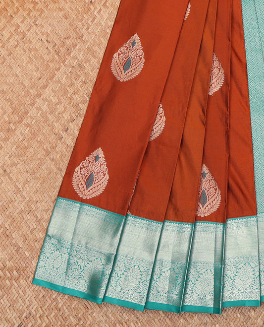 Rust Orange Budget Silk Saree, Masterfully Woven with Meena Buttas All Over Its Body, Complemented by a Contrast Traditional Zari Design Woven Border, Majestically Detailed Pallu of Jaal Designs, and Paired with a Contrast Blouse