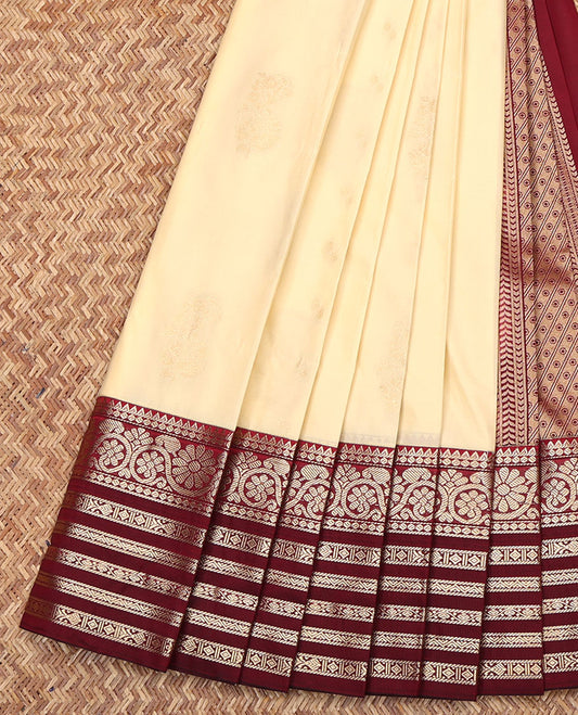 Cream Budget Silk Saree, Subtly Sparkled with Zari Buttas All Over Its Body, Complemented by a Contrast Traditional Zari Border of Floral Creeper Designs, Pallu of Polka Dot and Stripes, and Paired with a Contrast Blouse