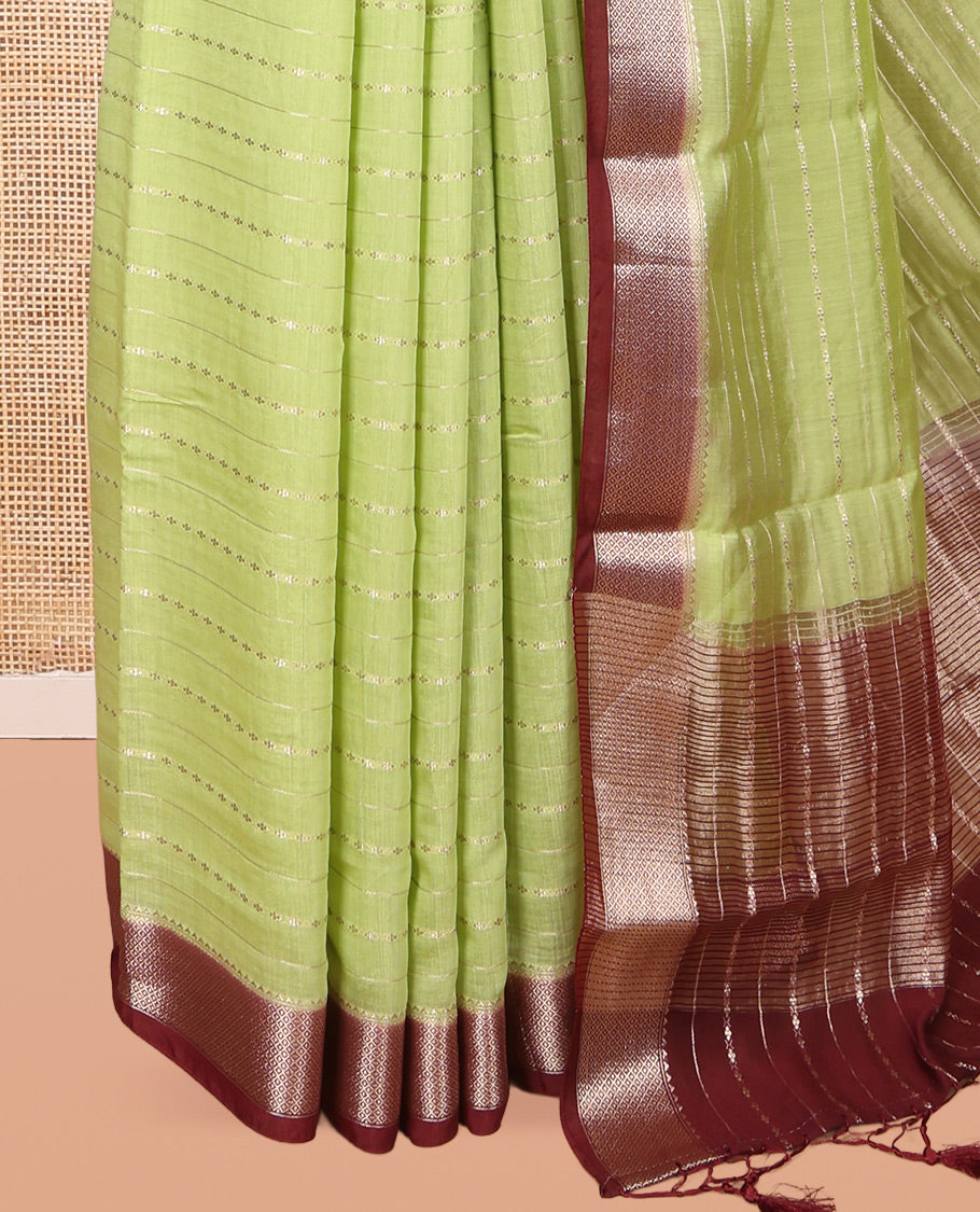 Green Assam Silk Saree, Elevated with Zari Stripes, Complemented by Contrast Zari Border,  Zari Woven Pallu, and Contrast Blouse