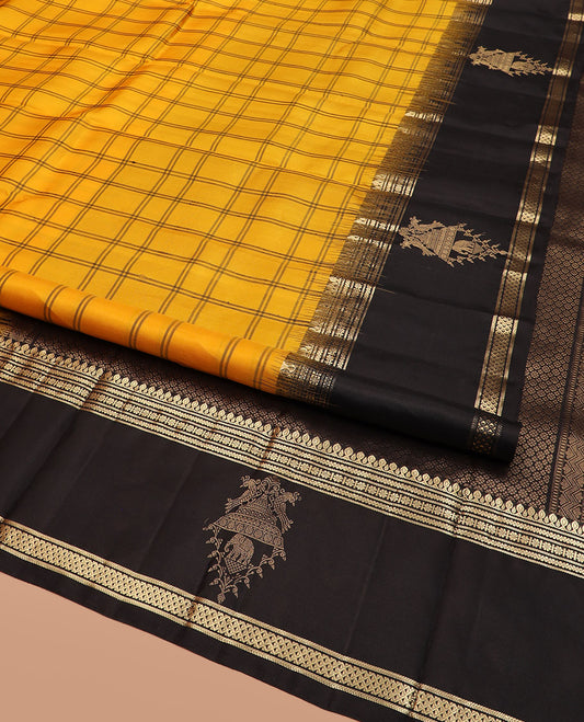 Yellow Kanchipuram Silk Saree Adorned with Checks on Its Body, Complemented by a Contrast Border of Thilakam Mokku, Banaras, Neli, Kamalam, Kili, and Yaanai Designs, Pallu Elegantly Woven with Kamalam Designs, and Paired with a Contrast Blouse