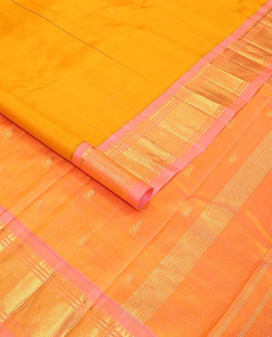 Orange buttas kancheepuram silk saree with contrast border of rekku, banaras design & zari design pallu