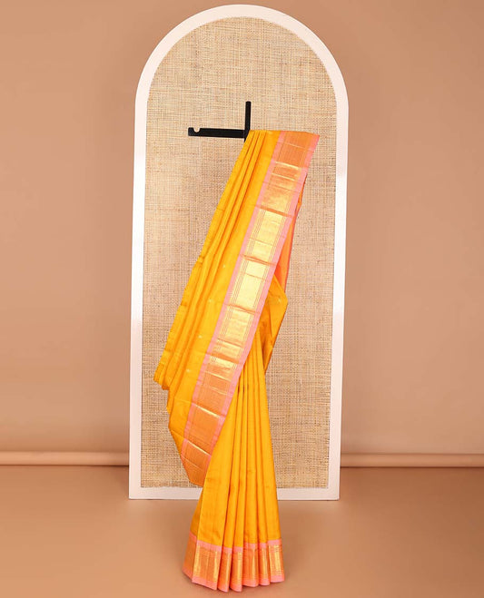 Orange buttas kancheepuram silk saree with contrast border of rekku, banaras design & zari design pallu