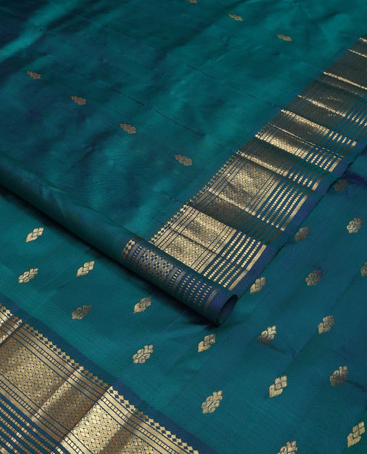 Blue zari buttas Kanchipuram silk saree, zari one-sided border of panner sombu,banaras,muthu & jaal designs & zari design pallu