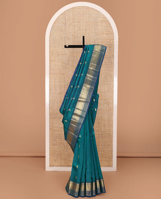 Blue zari buttas Kanchipuram silk saree, zari one-sided border of panner sombu,banaras,muthu & jaal designs & zari design pallu