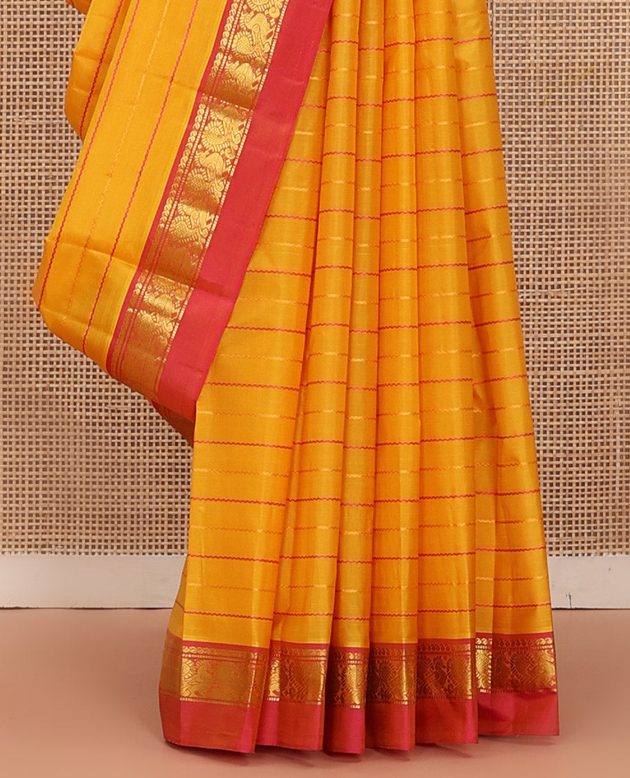 Yellow Kanchipuram Silk Saree Bedecked with Resham Threads Neli Stripes, Elevated with Contrast Kal Erangina Border Featuring Manga, Muthu, and Mayil Designs, Sparsely Woven Pallu, and Paired with a Contrast Blouse