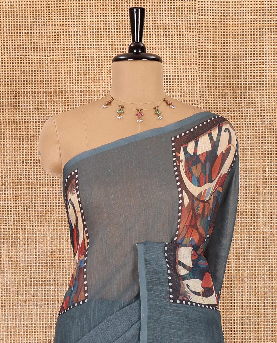 Green plain linen cotton saree, mordern art style elephant motifs printed border, elephant printed pallu, and a leaf printed blouse