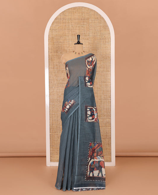 Green plain linen cotton saree, mordern art style elephant motifs printed border, elephant printed pallu, and a leaf printed blouse