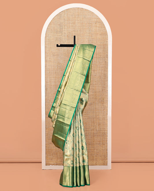 Gold Floral Jacquard Kanchipuram Tissue Silk Saree, Complemented by a Contrast Border of Thilakam Mokku, Muthu, Mayil Kann, Jaal, Cross Kamalam, and Manga, Grand Pallu, and a Matching Blouse