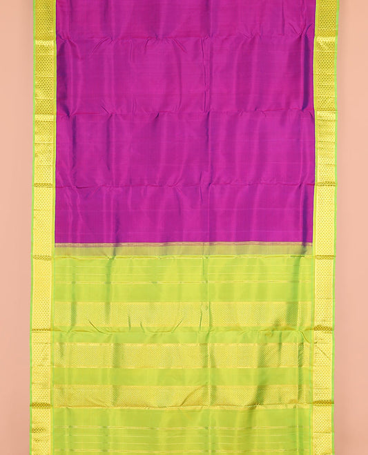 Purple plain nine-yard silk saree, contrast ara maadam design korvai border, and pallu of ara maadam designs