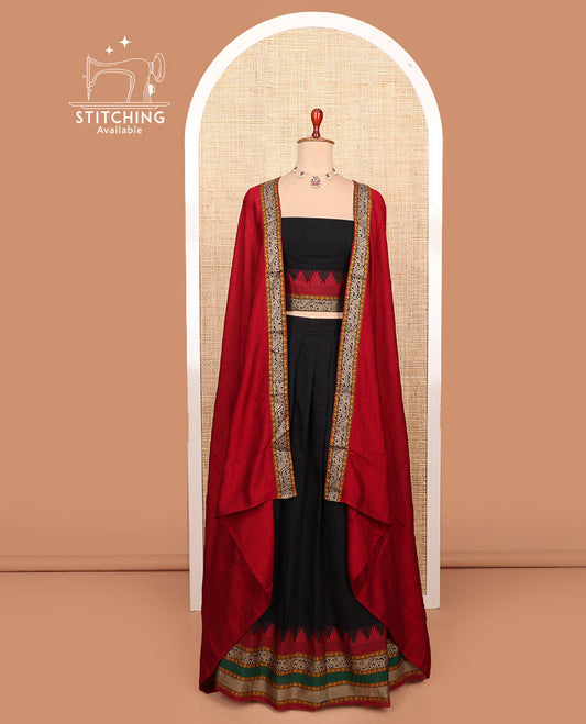 Black plain cotton half-saree with contrast temple traditional zari bordered skirt, a matching blouse, and a contrast traditional bordered dhavani