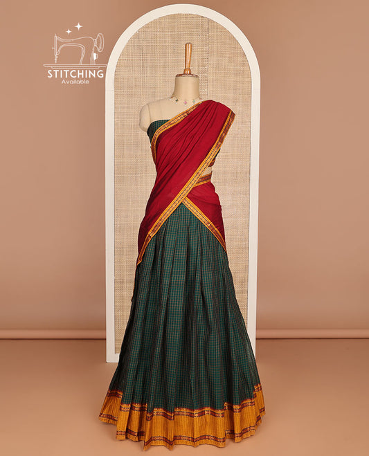 Green checked cotton half saree with contrast zari design border, checked blouse & plain, intricate zari design dhavani