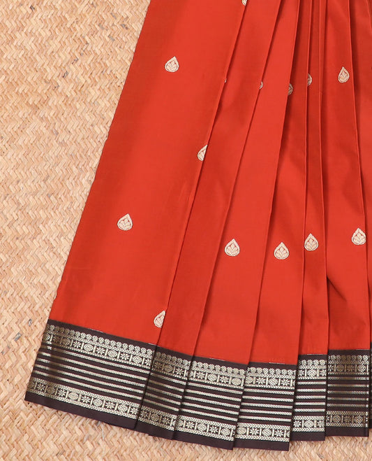 Orange thilakam motifs budget silk saree, contrast traditional zari design border, and jaal pallu