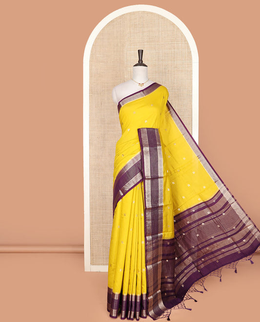 Yellow peacock buttas assam silk saree, contrast traditional zari border, and pallu of zari design