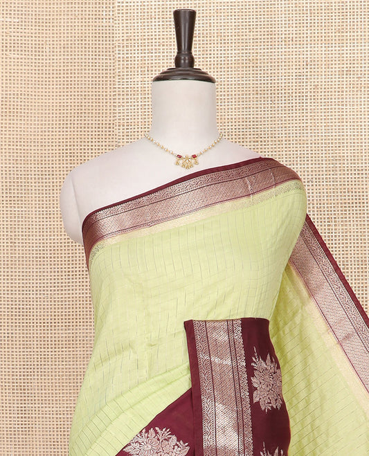 Yellow zari checked Assam silk saree, contrast traditional zari border of floral designs, and pallu of zari designs