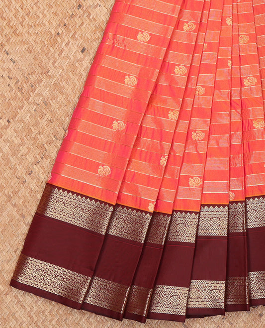 Orange Budget Silk Saree, Bedecked with Zari Stripes and Peacock Buttas on Its Body, Complemented by Contrast Traditional Zari Design Rettai Pettu Border, Opulently Embellished Pallu, and Paired with a Contrast Blouse
