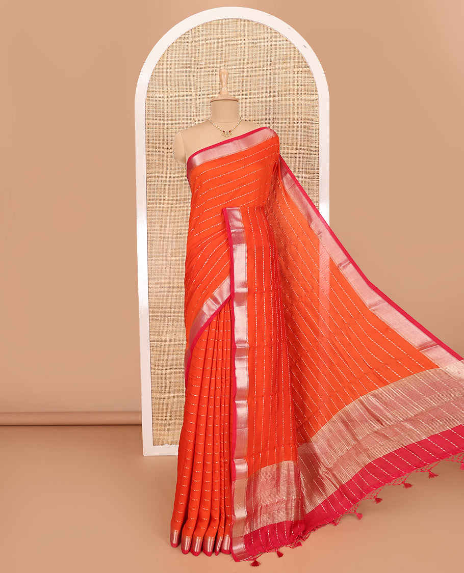 Dark Orange Assam Silk Saree Elevated with All-Over Buttas, Complemented with a Contrast Traditional Zari  Border, Zari-Striped Pallu, and Paired with a Contrast Blouse