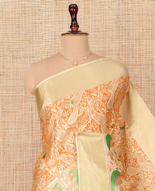 Orange Tissue Cotton Saree, Highlighted by Paisley Print and Paisley-Bird Motifs Embroidery on Its Body, Subtle Bavanji Border, Pallu Mirrors the Same Print, and Paired with a Matching Blouse