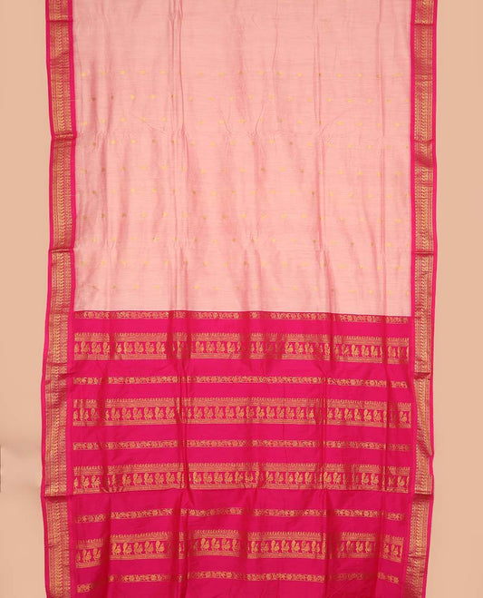 Peach buttas nine-yard cotton saree, contrast traditional zari border, and pallu steeped with traditional motifs