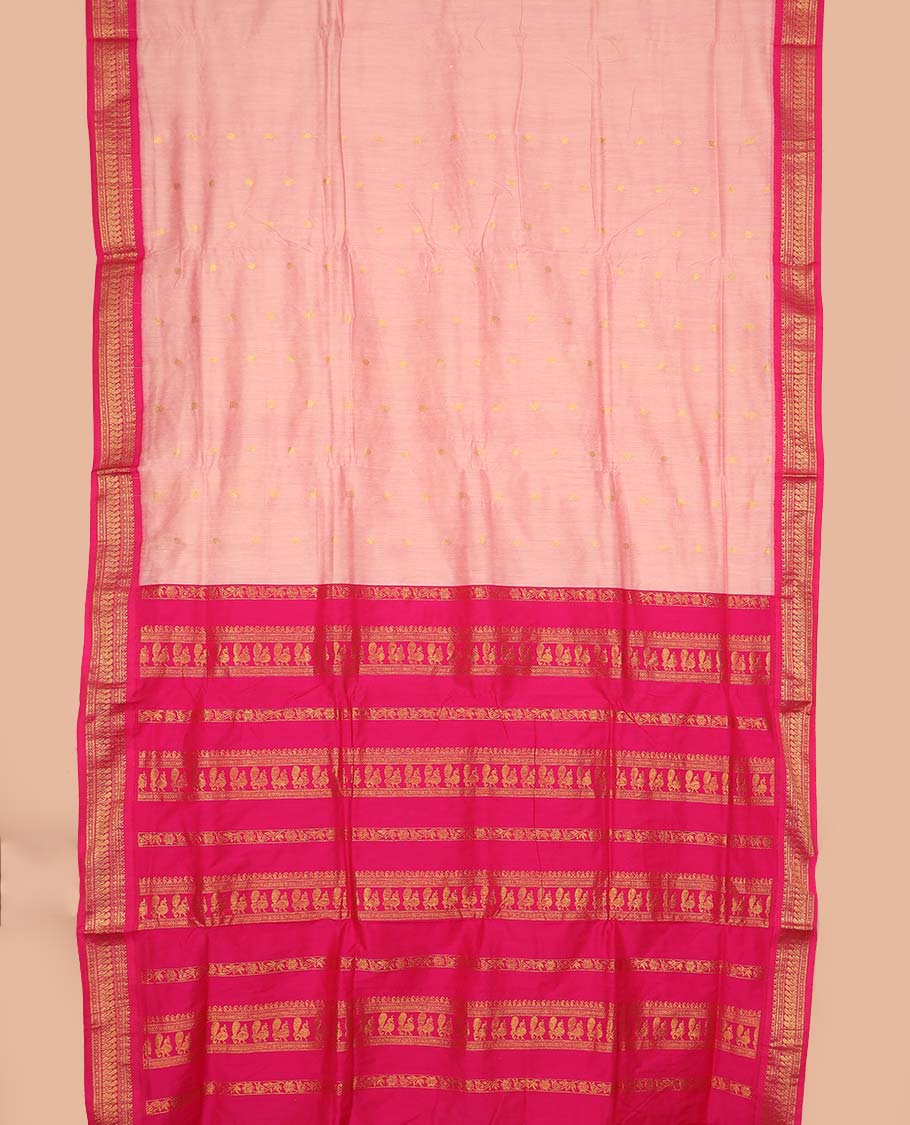 Peach buttas nine-yard cotton saree, contrast traditional zari border, and pallu steeped with traditional motifs