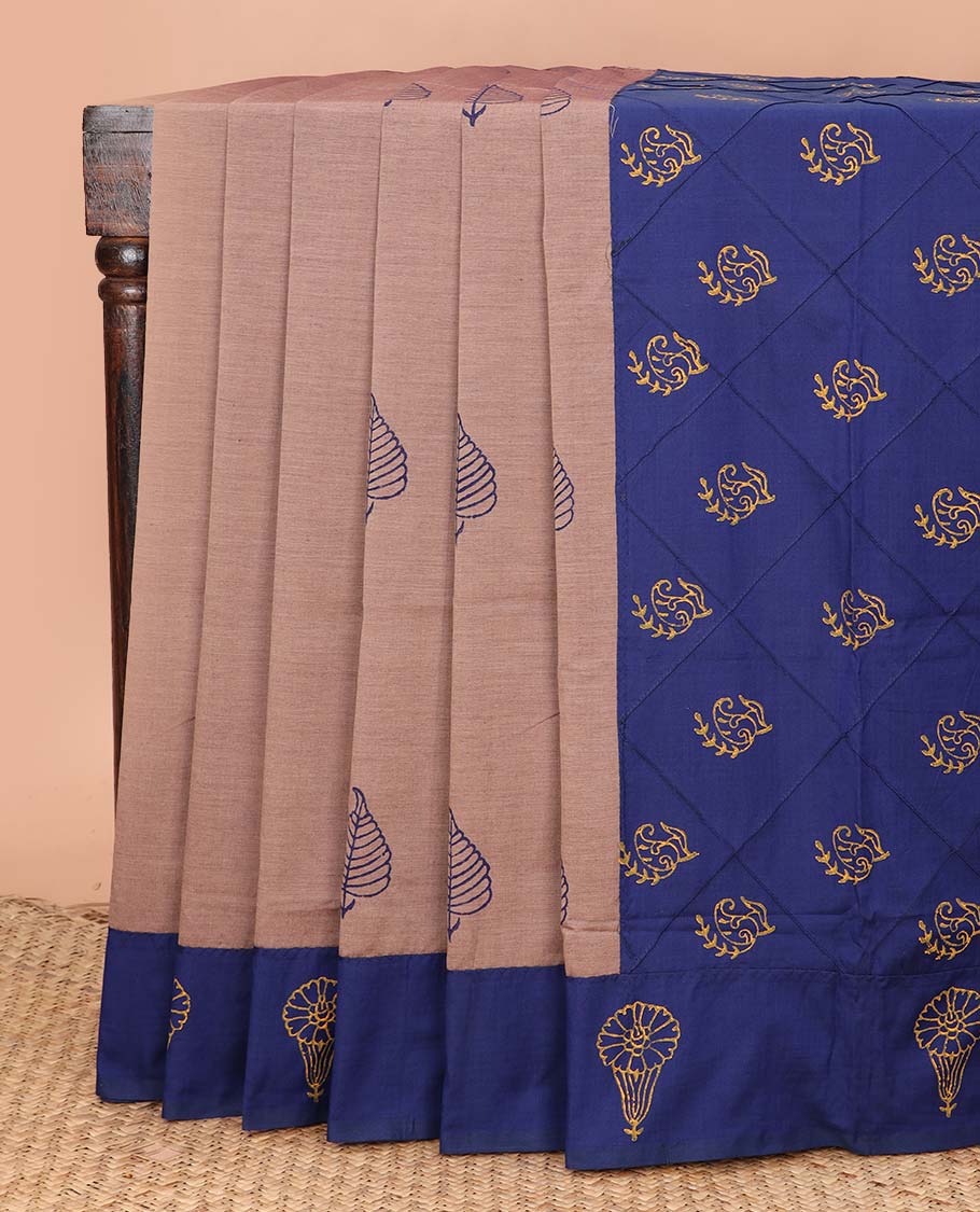 Brown leaf buttas block printed poly cotton saree, contrast floral printed border, and pallu of butta enclosed jaal design