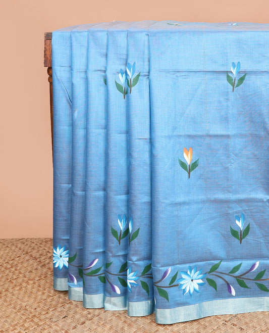 Blue hand brush painting style floral printed chirala cotton saree, plain border, and contrast floral printed pallu