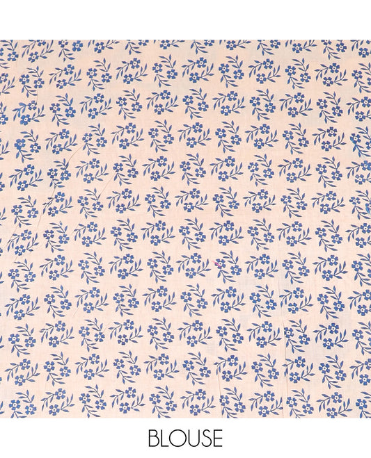 Red batik floral machine-printed cotton saree, contrast village-theme printed border, and pallu of Kalamkari peacocks