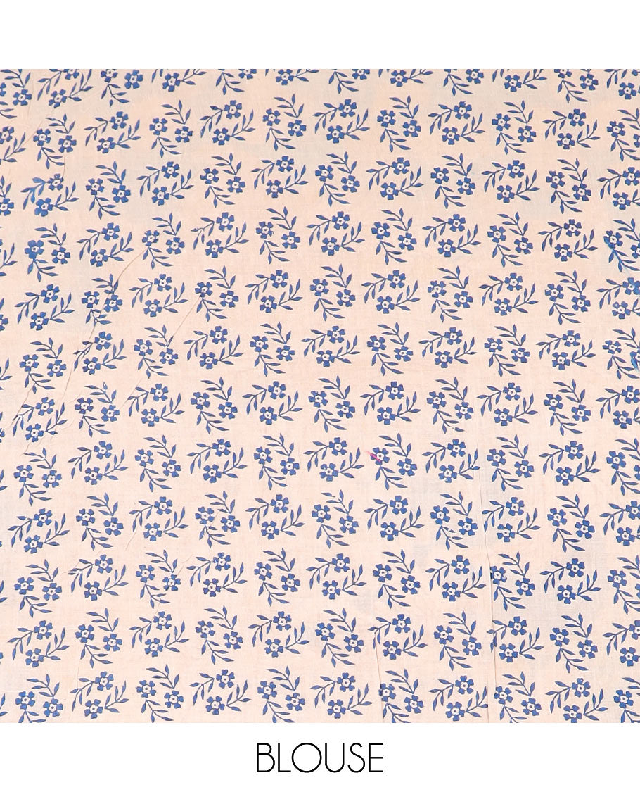 Red batik floral machine-printed cotton saree, contrast village-theme printed border, and pallu of Kalamkari peacocks